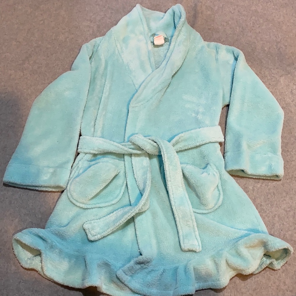 Light blue girl’s robe.